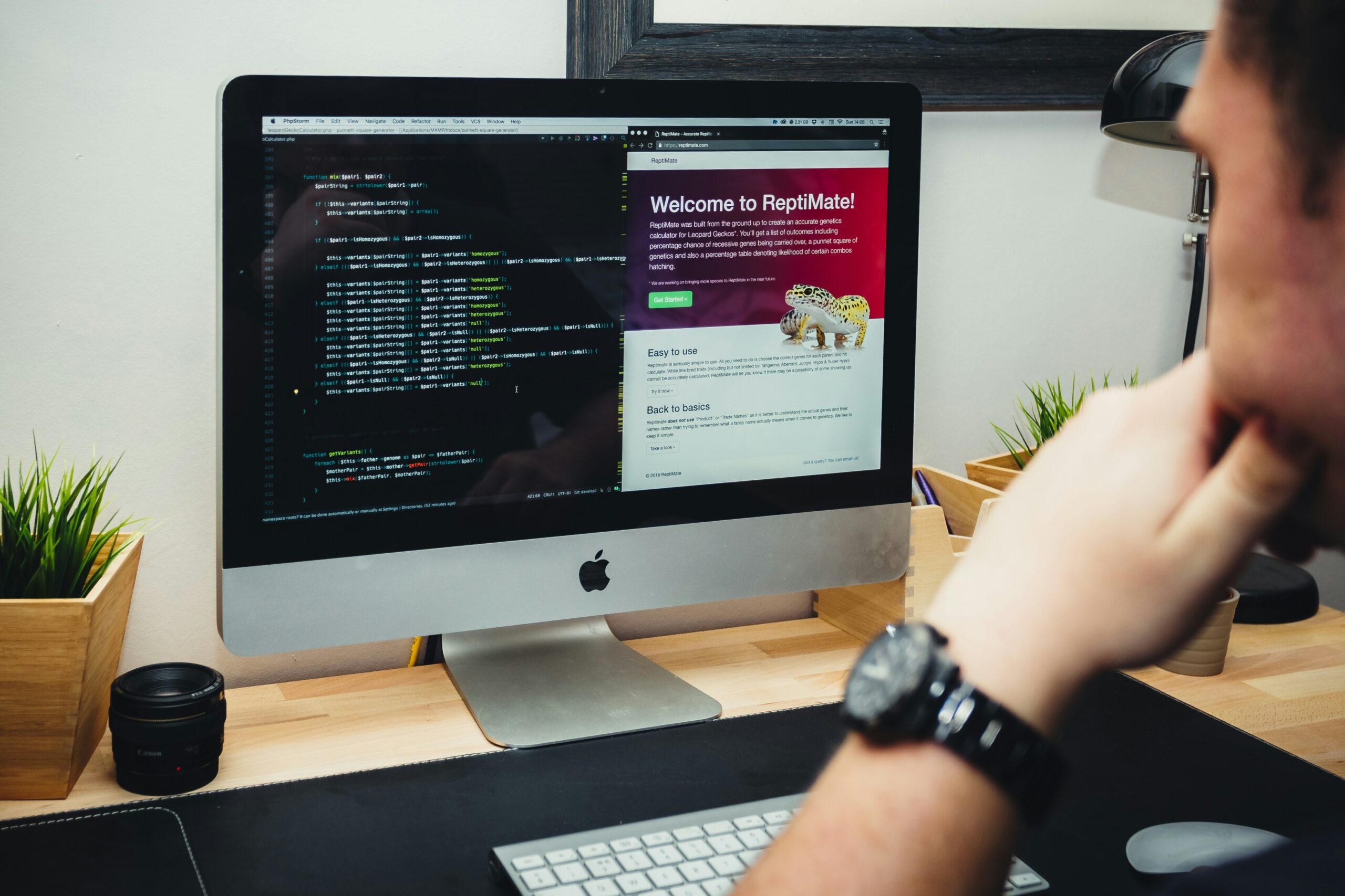 a man is sitting at a desk developing a website